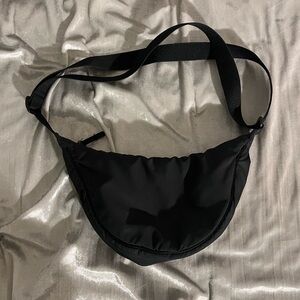 Black Uniqlo crossbody messenger bag